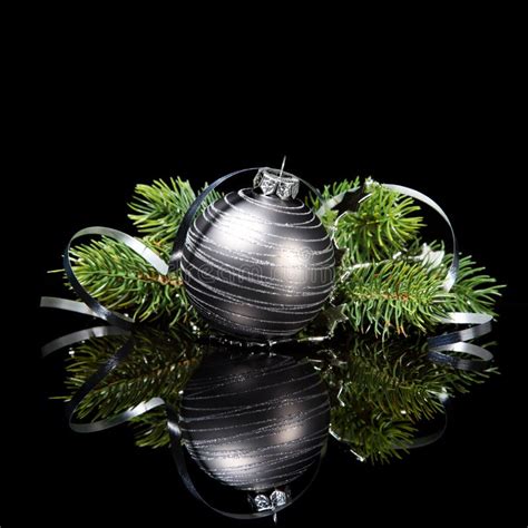 Christmas Ornament With Pine Tree Branches On A Bl Stock Photo Image