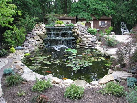 Waterfalls not only add beauty to all gardens they're a part of, but they also serve the vital purpose of aerating your. Pittsburgh Koi Pond Waterfall - Outdoor Fountains