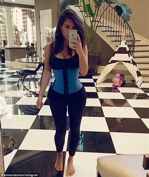 Kim Kardashian Squeezes Into A Corset For An Hourglass Selfie Taken In