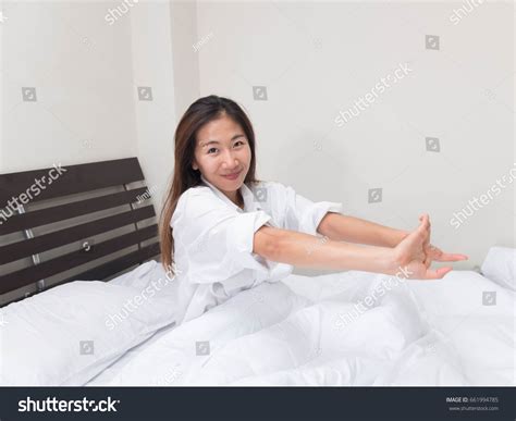 Women Stretched On Bed White Stock Photo 661994785 Shutterstock