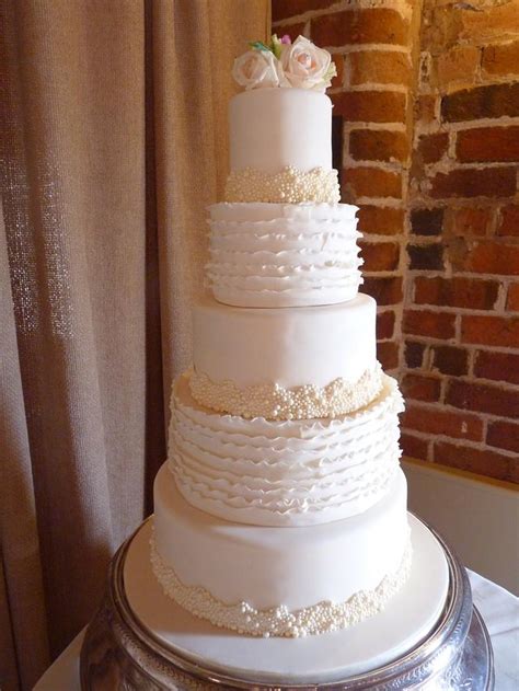 Ivory Pearl And Textured Ruffle Wedding Cake Cake By
