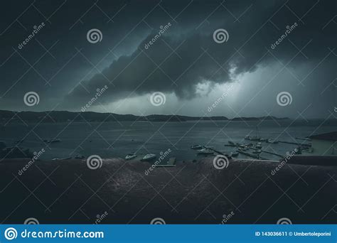 Stormy Clouds At The Sea Extreme Weather Condition Stock Image - Image of condition, pier: 143036611