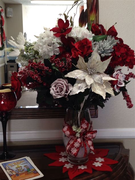 112m consumers helped this year. Christmas silk flower arrangement | Christmas floral, Silk ...