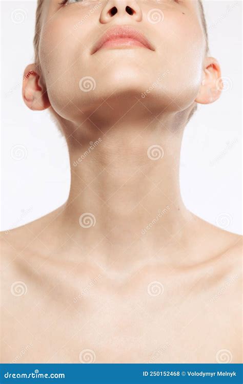 Close Up Female Neck Collarbones Isolated On White Studio Background