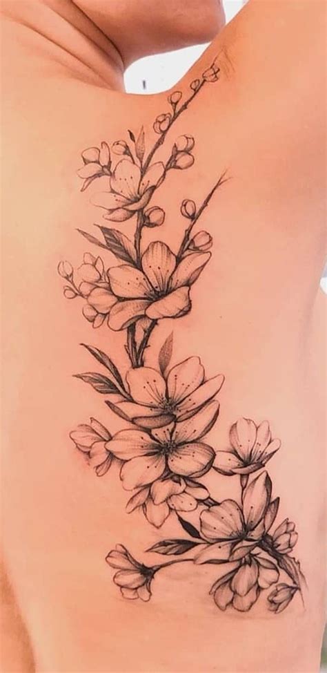 Flower Vine Tattoos Flower Tattoo On Ribs Cherry Blossom Tattoo