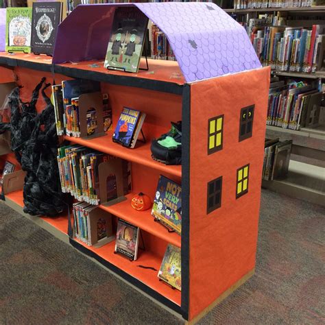 Halloween Book Display Includes Two Haunted Houses And A Spooky Tree
