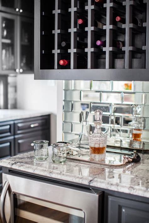 It's such a great way to weave a dynamic visual element into your kitchen design. Bar With Mirrored Tile Backsplash | HGTV