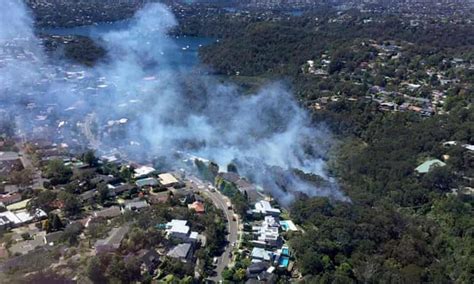 Dozens Of Bushfires Burn Across New South Wales As Crews Battle High
