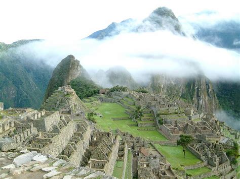 An Overview Of Machu Picchu Showing The Pyramid Outcrop That Holds The