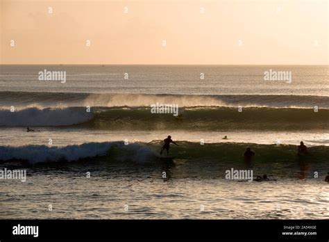 Surfing At Dreamland Beach In Bali Indonesia Stock Photo Alamy