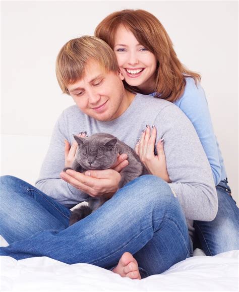 Couple With A Cat Stock Image Image Of Affectionate 22783977