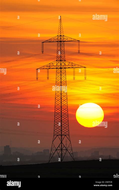 Electric Power Transmission Lines Electricity Pylon With The Setting
