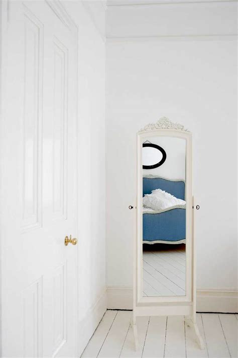 Should You Have A Mirror Facing Your Bedroom Door