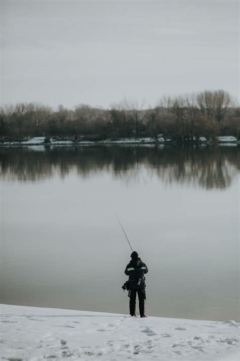 Free Picture Winter Riverbank Fishing Snowy Fisherman Snow Water