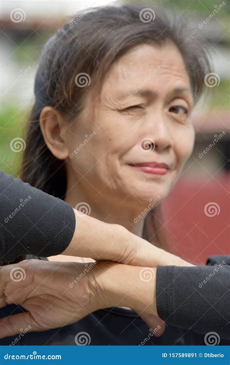 a winking retired filipina female senior stock image image of adult minorities 157589891
