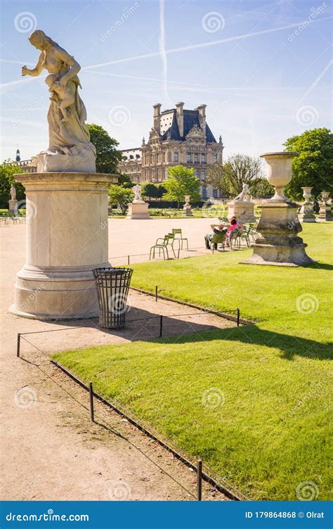 The Tuileries Garden In Paris With The Statue Of Medea And The Louvre