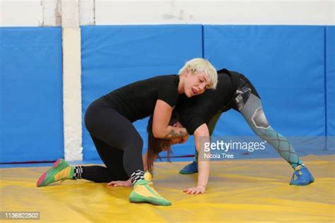 Female Wrestling Holds Photos And Premium High Res Pictures Getty Images