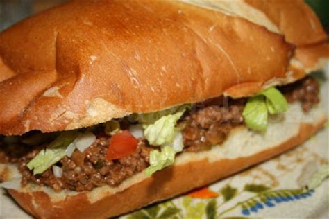In a dutch oven brown the beef with onion, garlic and chili flakes, stirring with a wooden spoon to crumble the beef. Deep South Dish: Yummy Loose Meat Hamburger Sandwich