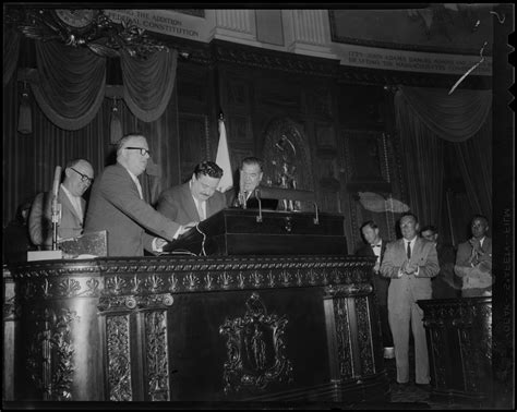 The dutch parliament is called the states general. Filmstage-television comedian Jackie Gleason stands with other men at a speaker's podium as he ...