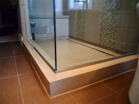 A flooring primer can help to improve adhesion on concrete floors that may be dry or porous and can be applied to a range of surfaces including wood or plaster. What kind of sealant did you apply to the concrete shower ...