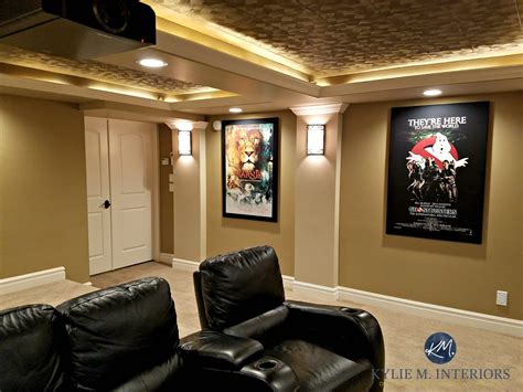 Home Theatre Room With Double Doors Black Recliners Movie Posters