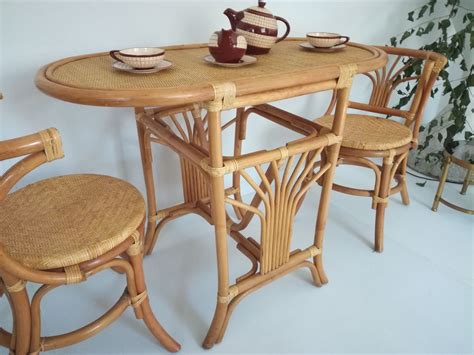 Ikeaâ€™s selection of small dining table sets come with two matching chairs included and are the perfect way to create an intimate dinner for two setting at home. Set of 2 vintage chairs and table in rattan - Design Market