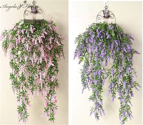 Their expertise will help you choose the best blooms for your venue and season, and they'll make your wedding flower ideas a reality. Artificial wall hanging fake flower vine DIY wedding ...