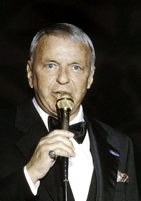 Posterazzi Frank Sinatra Holding A Microphone Photo Print 8 X 10