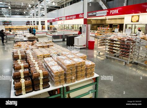 Customers Shopping In The Bakery Section Of A Costco Wholesale