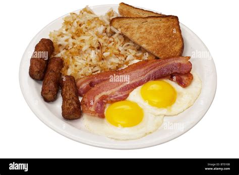 Breakfast Plate With Eggs Sausage Hash Browns Bacon And Toast