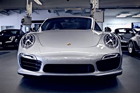 Porsche Enthusiasts Magnus Walker And Tony Hatter Examine The New 911