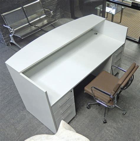 A glass corner desk is rather common in contemporary offices and home work zone arrangements. Rectangular White Reception Desk w/Frosted Glass Panel