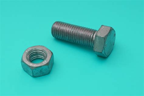 Nut And Bolt On Cyan 4169 Stockarch Free Stock Photo Archive