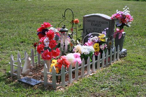 The first gravesite decoration idea that you can follow is by giving some small stones on top of the headstone. Baby Grave Decorations | Best Baby Decoration