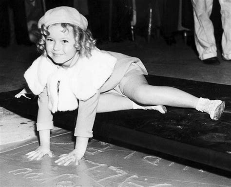 Shirley Temple Signing Her Name At Graumans Chinese Theatre March 14