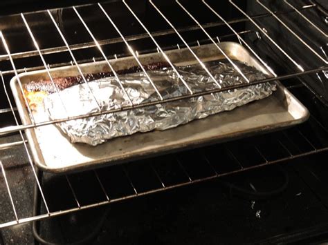It usually transfer the pork to a clean cutting board, tent loosely with aluminum foil, and let it rest for 10 minutes before slicing crosswise. Beef Ribs Wrapped in Aluminum Foil in the Oven by Man Fuel ...