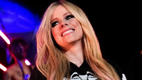Avril Lavigne Sports Memorable See Through Vest And Necktie As She