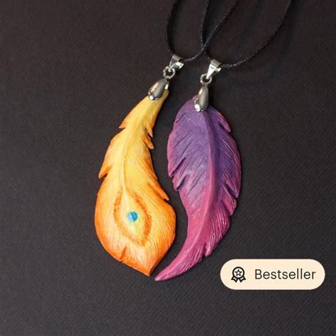 Stick around with squad for more gift ideas! Xayah and Rakan necklaces from League of Legends LOL with feathers, love and friendship gift in ...