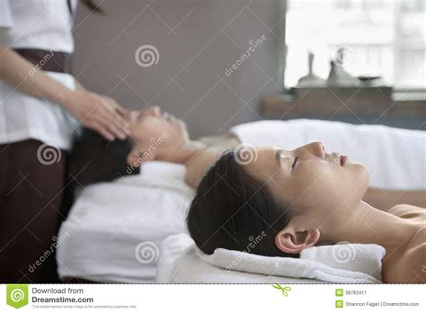 Mother And Daughter Having Head Massage Together Stock Image Image
