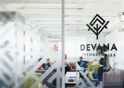 An Office With People Sitting In Chairs And The Logo For Devana