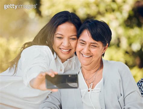 woman mature mother or selfie in garden on mothers day taking photograph for memory support or