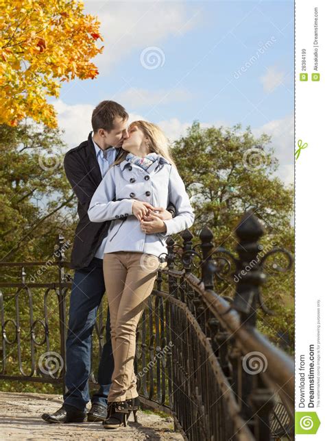 Romantic Couple Kissing In Autumn Park Stock Image Image Of Happiness