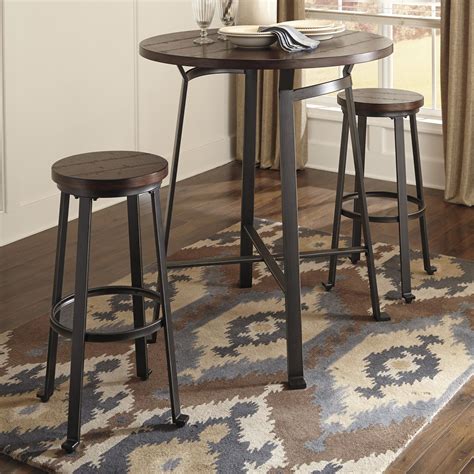 Complete your game room furniture with classy pool table additions and handpicked furniture pieces like quality bar tables and stools. Ashley Signature Design Challiman 3-Piece Round Bar Table ...