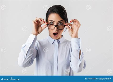 Image Of Surprised Secretary Woman 30s Wearing Eyeglasses Standing In The Office Isolated Over