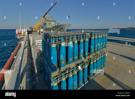 High Explosive Naval Artillery Shell Warheads In A Loading Crate On A