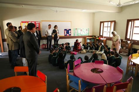 Prince Rahim And Princess Salwa Aga Khan With Students And Teachers At