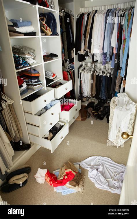Untidy Teenage Bedroom With Messy Wardrobe Stock Photo Alamy