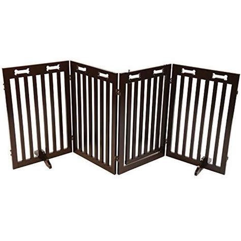 The mainframe attaches to fixed structures such as walls but the gate can be opened for you to walk through. Free Standing Wood Dog Gate w/ Walk Through Door - Arf Pets