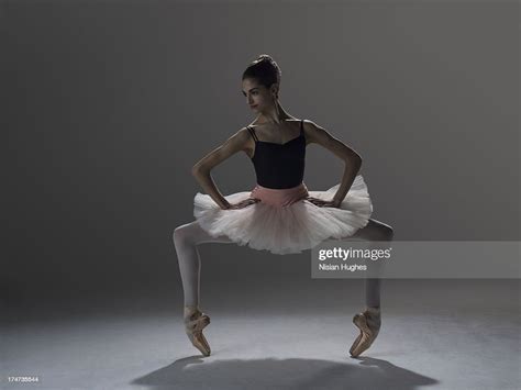 Ballerina In Grand Plie On Pointe Photo Getty Images
