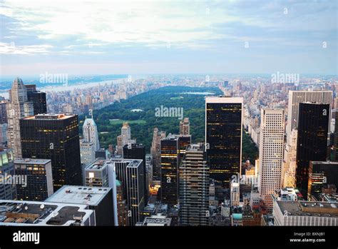 New York City At Dusk With Central Park Surrounded By Skyscrapers With